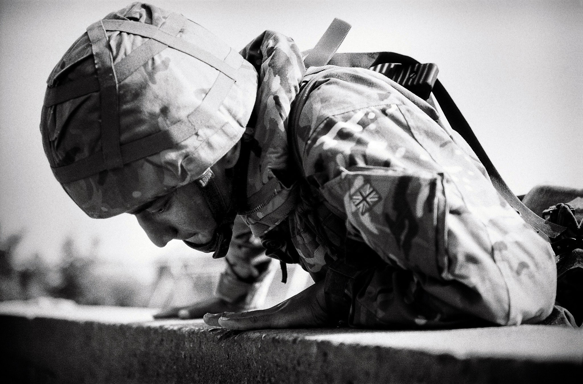 Climbing the 2-meter (6 ft) training wall in full combat gear, rifle slung across the back, is not a recruit favourite.