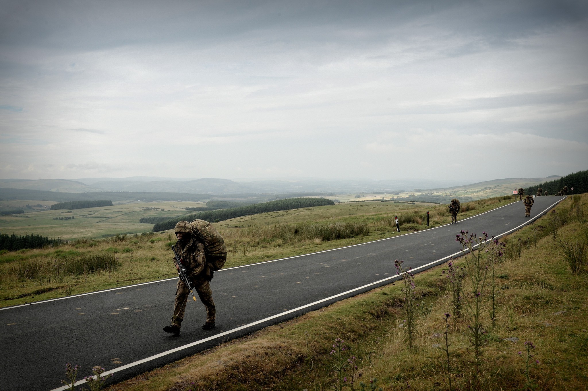 A long march in full combat gear during an exercise in Wales