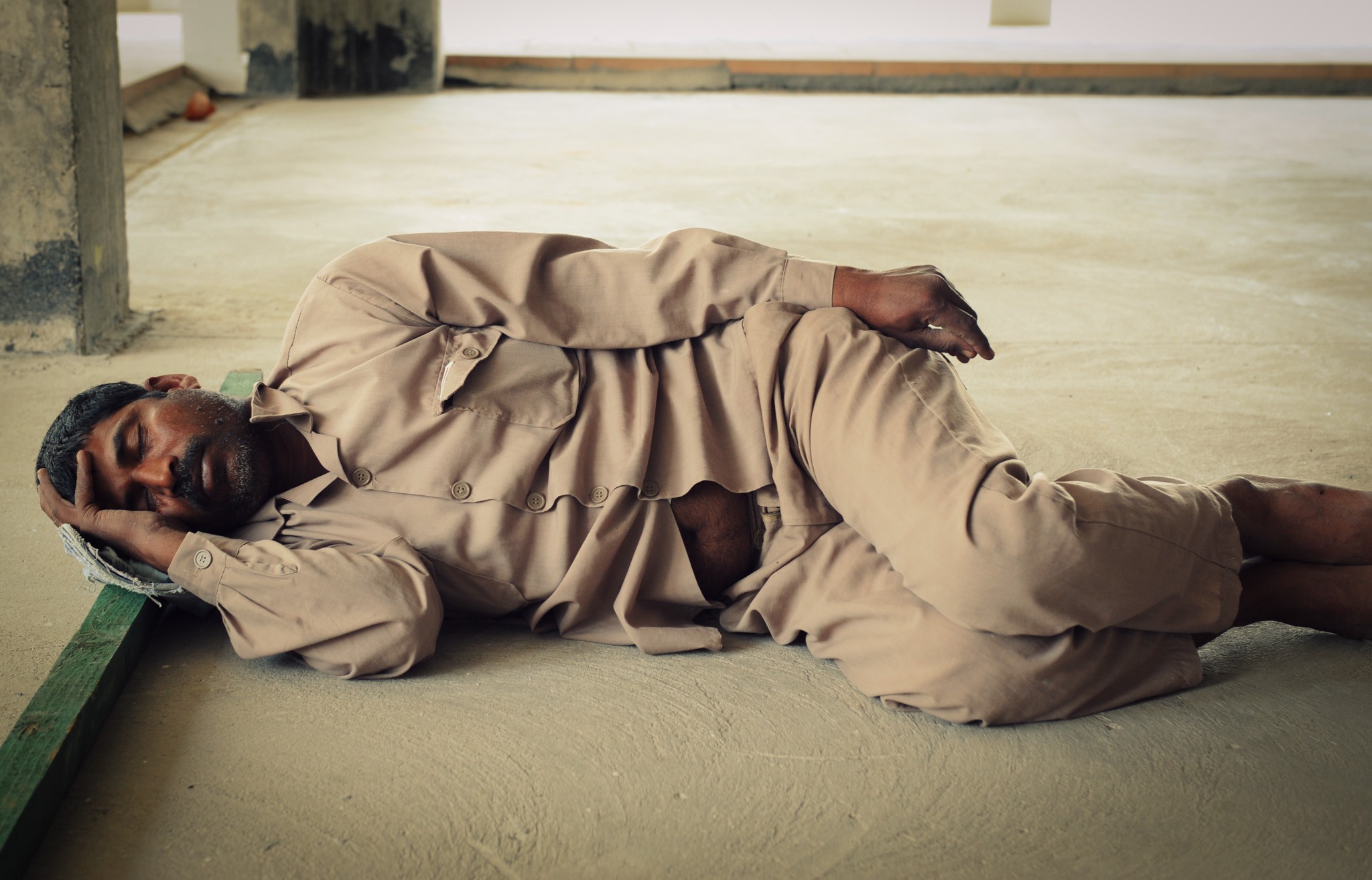 Tired labourer, Dubai