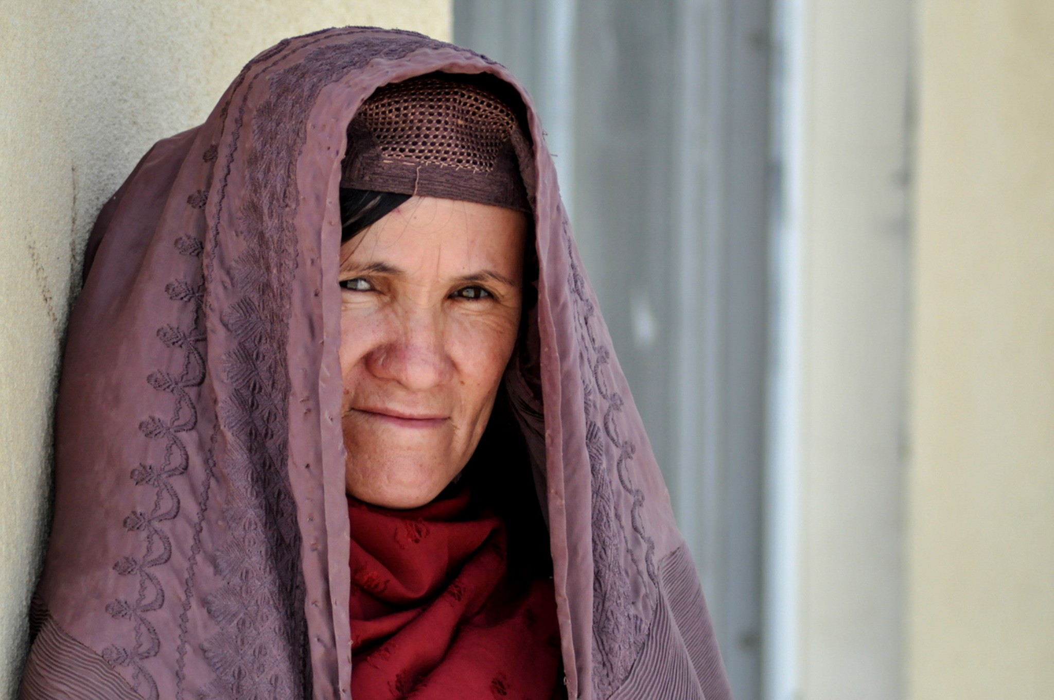 Afghan woman, who endearingly insisted on not having her picture taken until she had pulled up her burkha